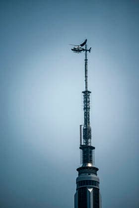 Trespassers on the Empire State Building Two people climbed to the top of the Empire State Building in New York on Wednesday, July 1, 2026 and unfurled a black banner saying When the power of love beats the love of power, the world knows peace, (  RichardxB.xLevine