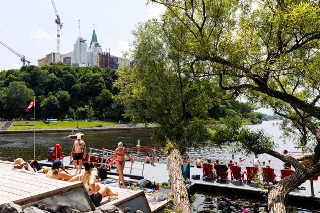 July 1, 2026, Ottawa, On, Canada: People cool off at the newly opened East Wharf Dock on Canada Day in Ottawa amid a heat warning on Wednesday, July 1, 2026. Ottawa Canada  - ZUMAc35_ 20260701_zaf_c35_090 Copyright: xKeitoxNewmanx