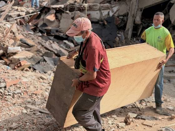 Debris removal after earthquake in Caracas CARACAS, VENEZUELA - JULY 01: Rescue workers and civilian volunteers remove debris from the ruins of bakeries and tourist shops that collapsed following the powerful earthquake that struck the region in Caracas, Venezuela, on July 01, 2026. Cleanup efforts are focused on restoring the affected commercial areas. Julio Urribarri Anadolu Caracas Venezuela. Editorial use only. Please get in touch for any other usage.  Copyright: x2026xAnadoluxJulioxUrribarrix