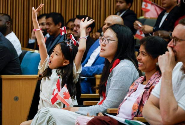 July 1, 2026, Cremona, Ab, CANADA: Josie Ng, six, celebrates after becoming a Canadian during a Canada Day citizenship ceremony in Cremona, Alta., Wednesday, July 1, 2026. Cremona CANADA  - ZUMAc35_ 20260701_zaf_c35_124 Copyright: xJeffxMcintoshx