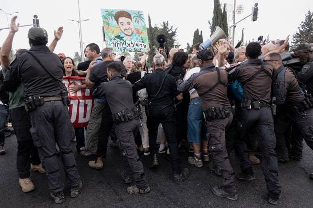 July 2, 2026, Jerusalem, Israel: Anti government protesters deploy a massive crate to block the main intersection outside the Knesset during a nationwide Day of Rage. Activists gathered at exactly 6:29 a.m. to mark the 1,000th day since the October 7, 2023 attacks, which they have dubbed the Netanyahu Massacre, demanding accountability for the government s failure to prevent the initial attacks, secure the release of all hostages alive, the ongoing 3 year war and for establishing a state commission of inquiry. Jerusalem Israel - ZUMAa126 20260702_zap_a126_004 Copyright: xNirxAlonx