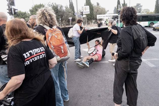 July 2, 2026, Jerusalem, Israel: Anti government protesters deploy a massive crate to block the main intersection outside the Knesset during a nationwide Day of Rage. Activists gathered at exactly 6:29 a.m. to mark the 1,000th day since the October 7, 2023 attacks, which they have dubbed the Netanyahu Massacre, demanding accountability for the government s failure to prevent the initial attacks, secure the release of all hostages alive, the ongoing 3 year war and for establishing a state commission of inquiry. Jerusalem Israel - ZUMAa126 20260702_zap_a126_006 Copyright: xNirxAlonx