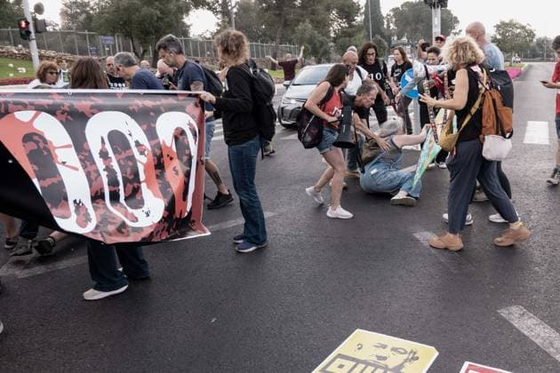 July 2, 2026, Jerusalem, Israel: Anti government protesters deploy a massive crate to block the main intersection outside the Knesset during a nationwide Day of Rage. Activists gathered at exactly 6:29 a.m. to mark the 1,000th day since the October 7, 2023 attacks, which they have dubbed the Netanyahu Massacre, demanding accountability for the government s failure to prevent the initial attacks, secure the release of all hostages alive, the ongoing 3 year war and for establishing a state commission of inquiry. Jerusalem Israel - ZUMAa126 20260702_zap_a126_007 Copyright: xNirxAlonx
