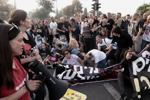 July 2, 2026, Jerusalem, Israel: Anti government protesters deploy a massive crate to block the main intersection outside the Knesset during a nationwide Day of Rage. Activists gathered at exactly 6:29 a.m. to mark the 1,000th day since the October 7, 2023 attacks, which they have dubbed the Netanyahu Massacre, demanding accountability for the government s failure to prevent the initial attacks, secure the release of all hostages alive, the ongoing 3 year war and for establishing a state commission of inquiry. Jerusalem Israel - ZUMAa126 20260702_zap_a126_013 Copyright: xNirxAlonx