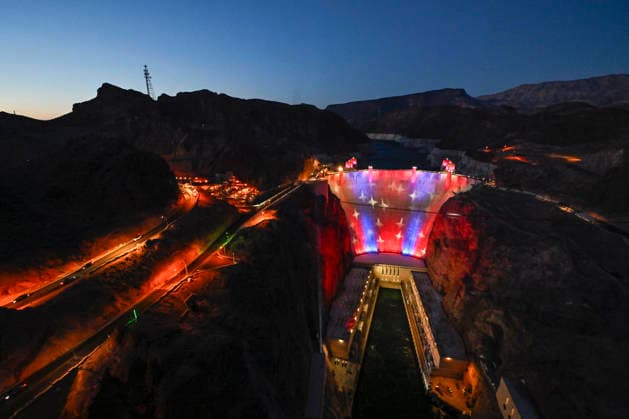 July 1, 2026 - Boulder City, Nevada, U.S. - Patriotic lighting illuminates the Hoover Dam on July 1, 2026 in the Lake Mead National Recreation Area, near Boulder City, Nevada. The dam will be lit through July 4, 2026 to mark the 250th anniversary of the United States Declaration of Independence. Boulder City USA - ZUMAbk3_ 20260701_zaf_bk3_005 Copyright: xDavidxBeckerx
