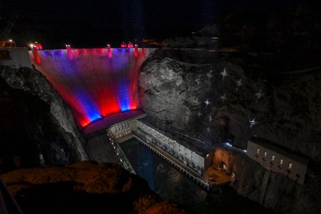July 1, 2026 - Boulder City, Nevada, U.S. - Patriotic lighting illuminates the Hoover Dam on July 1, 2026 in the Lake Mead National Recreation Area, near Boulder City, Nevada. The dam will be lit through July 4, 2026 to mark the 250th anniversary of the United States Declaration of Independence. Boulder City USA - ZUMAbk3_ 20260701_zaf_bk3_007 Copyright: xDavidxBeckerx