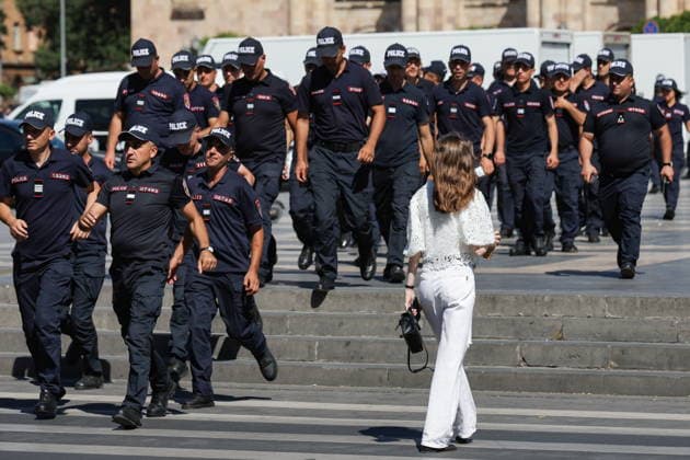 ARMENIA, YEREVAN - JULY 2, 2026: Police officers are seen during a protest outside the Government House amid talks between European Commission President von der Leyen and Armenia s President Pashinyan. Alexander Patrin TASS  94569359