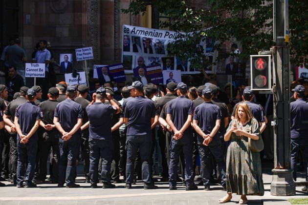 ARMENIA, YEREVAN - JULY 2, 2026: Police officers stand guard during a protest outside the Government House amid talks between European Commission President von der Leyen and Armenia s President Pashinyan. Alexander Patrin TASS  94569520
