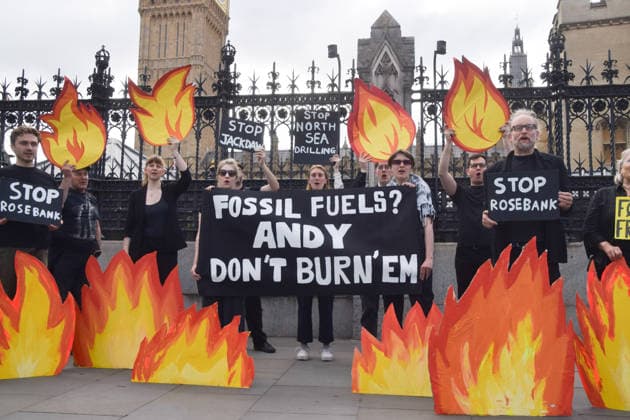 July 2, 2026, London, England, United Kingdom: Activists from Fossil Free London stage a protest outside the parliament calling on Andy Burnham, who is expected to become the next UK Prime Minister, not to open the North Sea to oil and gas projects like Jackdaw and Rosebank. London United Kingdom - ZUMAv130 20260702_zip_v130_001 Copyright: xVukxValcicx