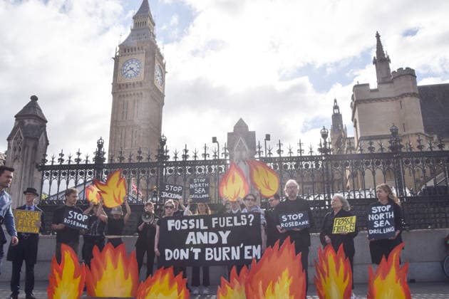 July 2, 2026, London, England, United Kingdom: Activists from Fossil Free London stage a protest outside the parliament calling on Andy Burnham, who is expected to become the next UK Prime Minister, not to open the North Sea to oil and gas projects like Jackdaw and Rosebank. London United Kingdom - ZUMAv130 20260702_zip_v130_005 Copyright: xVukxValcicx