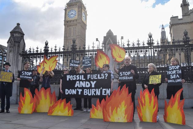 July 2, 2026, London, England, United Kingdom: Activists from Fossil Free London stage a protest outside the parliament calling on Andy Burnham, who is expected to become the next UK Prime Minister, not to open the North Sea to oil and gas projects like Jackdaw and Rosebank. London United Kingdom - ZUMAv130 20260702_zip_v130_006 Copyright: xVukxValcicx