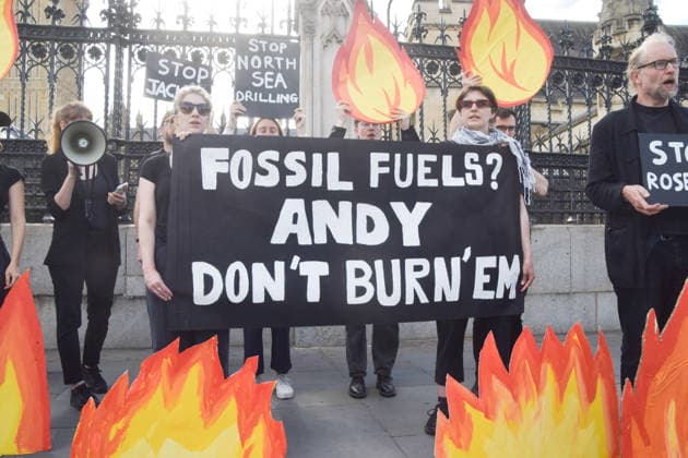 July 2, 2026, London, England, United Kingdom: Activists from Fossil Free London stage a protest outside the parliament calling on Andy Burnham, who is expected to become the next UK Prime Minister, not to open the North Sea to oil and gas projects like Jackdaw and Rosebank. London United Kingdom - ZUMAv130 20260702_zip_v130_013 Copyright: xVukxValcicx
