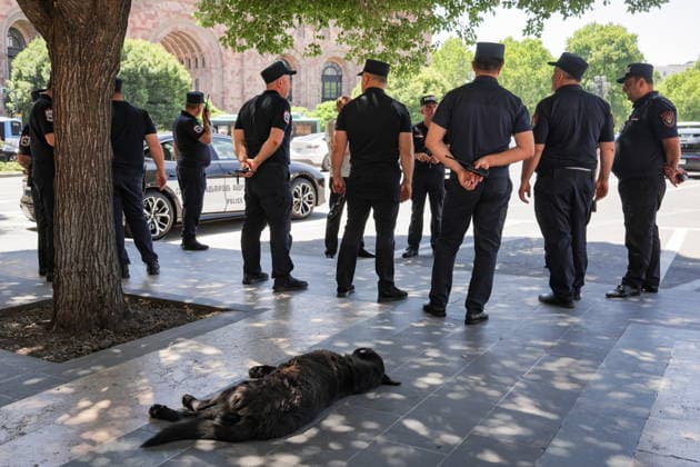 ARMENIA, YEREVAN - JULY 2, 2026: Police officers stand guard during a protest outside the Government House amid talks between European Commission President von der Leyen and Armenia s President Pashinyan. Alexander Patrin TASS  94570481