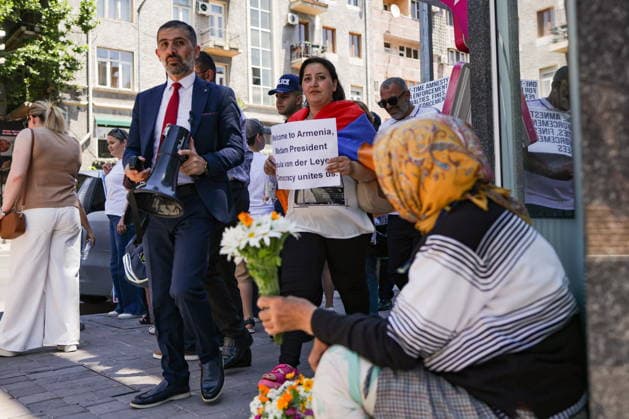 ARMENIA, YEREVAN - JULY 2, 2026: Protesters are seen in a street amid talks between European Commission President von der Leyen and Armenia s President Pashinyan. Alexander Patrin TASS  94570573