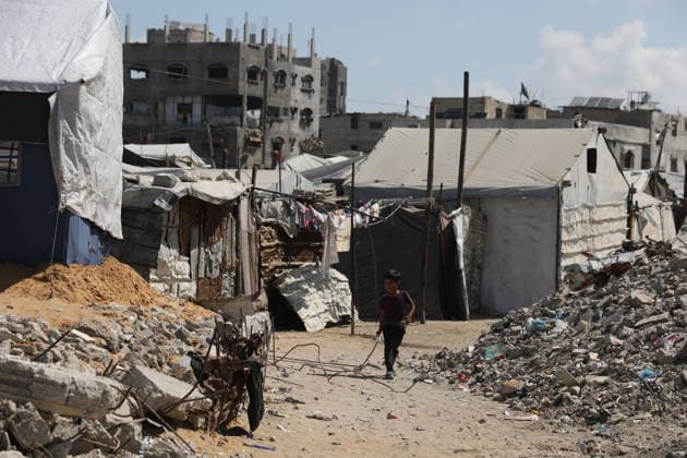 Displaced Palestinians Shelter Near Destroyed Homes as War Reaches 1,000 Days Displaced Palestinians go about their daily lives in worn-out tents erected near their destroyed homes east of Gaza City on July 2, 2026, as the war enters its 1,000th day. Hundreds of thousands of Palestinians continue to live in shelters and temporary camps following repeated displacement, while facing shortages of water, food and essential services, according to the United Nations and humanitarian organizations. Photo by Bilal Osama apaimages Gaza city Gaza Strip Palestinian Territory 020726_Gaza_BO_01(18) Copyright: xapaimagesxBilalxOsamax xapaimagesx