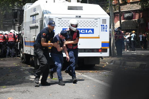 Protest over Zvernec Tourism Project held outside Albanian Parliament TIRANA, ALBANIA - JULY 2: Demonstrators protesting a planned tourism development project in the Zvernec area of Vlora gather outside the Albanian Parliament in Tirana on July 2, 2026, as protests that have continued for more than a month entered a new phase. Scuffles broke out between police and protesters during the demonstration. Protesters threw eggs and flour at police officers, members of parliament and parliamentary vehicles. Olsi Shehu Anadolu Tirana Albania. Editorial use only. Please get in touch for any other usage.  Copyright: x2026xAnadoluxOlsixShehux