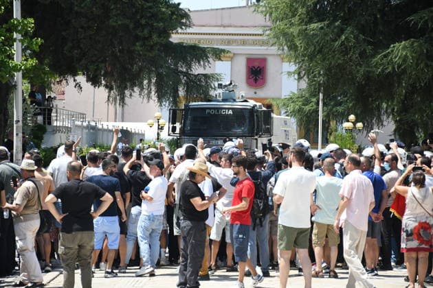 Protest over Zvernec Tourism Project held outside Albanian Parliament TIRANA, ALBANIA - JULY 2: Demonstrators protesting a planned tourism development project in the Zvernec area of Vlora gather outside the Albanian Parliament in Tirana on July 2, 2026, as protests that have continued for more than a month entered a new phase. Scuffles broke out between police and protesters during the demonstration. Protesters threw eggs and flour at police officers, members of parliament and parliamentary vehicles. Olsi Shehu Anadolu Tirana Albania. Editorial use only. Please get in touch for any other usage.  Copyright: x2026xAnadoluxOlsixShehux