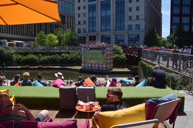 July 2, 2026, London, England, United Kingdom: People watch Wimbledon tennis matches on the large Everyman On The Canal screen in Granary Square next to Regent s Canal in King s Cross. The cinema chain sets up the screen, beanbags, a bar, and free sport and film screenings during the summer months. London United Kingdom - ZUMAv130 20260702_zip_v130_022 Copyright: xVukxValcicx