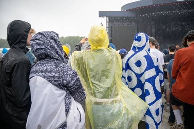 people wear rain protection during the first day of the Rock Werchter music festival in Werchter, Thursday 02 July 2026. The 51th edition of the festival is taking place from July 2 to July 5.  JONASxROOSENS 180170585