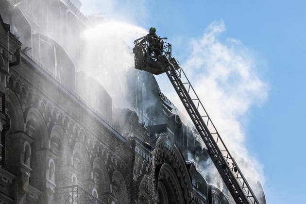 RECORD DATE NOT STATED A rescuer on an aerial platform extinguishes a fire at a hotel building damaged in a massive Russian missile and drone attack in the Shevchenkivskyi district of Kyiv, Ukraine, on July 2, 2026. The Russian military launched a massive attack on the city using attack drones and various types of missiles. At least 13 people were killed and 56 others were injured in the strike. Private homes, apartment buildings, an ambulance substation and a hotel building were damaged (Photo by Hennadii Minchenko Ukrinform) Downtown Kyiv hotel damaged in Russian attack  Copyright: xHennadiixMinchenkox