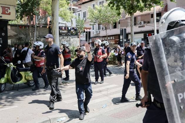 Day 33 Protest Turns Violent in Tirana TIRANA, ALBANIA JULY 2, 2026: Demonstrators gathered outside the Albanian Parliament during the thirty-third consecutive day of protests against a proposed luxury tourism development project linked to Jared Kushner and other international investors. Protesters threw eggs toward lawmakers and official vehicles as members of parliament arrived for the parliamentary session. Clashes erupted after police intervened, using tear gas, pepper spray and water cannons to disperse demonstrators, while protesters responded by throwing stones and damaging a police vehicle. Around 20 protesters were detained, according to protest organizers, before the movement continued with its scheduled evening demonstration Copyright: x xVlasovxSulajx xJNAxPressx