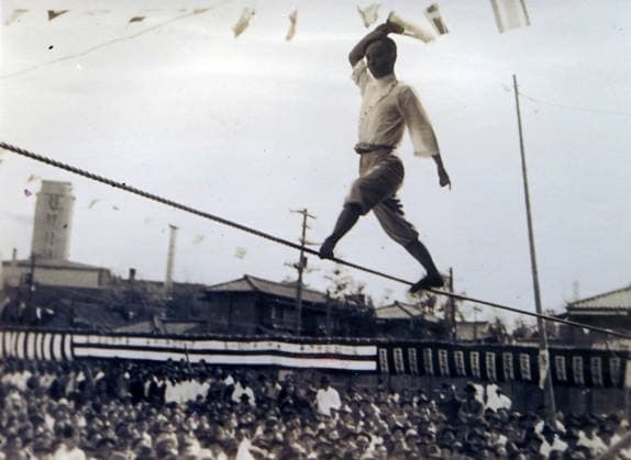 RECORD DATE NOT STATED Japanese Colonial Period; Korea: Jultagi (tightrope-walking) Japanese Colonial Period, Korea: Jultagi (tightrope-walking), 1930s. Traditional Korean performance. It is included into South Korea s Important Intangible Cultural Properties. It is an acrobatics in which one balances with a fan and moves back and forth between the ends of both thin rope. Even under Japanese oppression, this traditional Korean culture was not lost. Editorial use only. All other uses to be cleared with the copyright owner (World History Archive), in advance., WHA_161_0247.jpg, Japanese Colonial Period; Korea; Jultagi; tightrope-walking; 1930s; Traditional Korean performance; South Korea; Important Intangible Cultural Properties; acrobatics; Copyright: xWorldxHistoryxArchivex