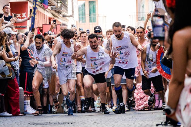 27th Edition of the MADO High-Heel Race Several people run during the 27th edition of the High-Heel Race on Pelayo Street on July 2, 2026, in Madrid, Spain. The 2026 Madrid LGBTIQ Pride Festival hosts the traditional High-Heel Race, hosted by artist Chumina Power. It is a festive sporting event in which participants must complete the course while wearing heels up to 15 centimeters high. JULY 2, 2026 Carlos Lujá Madrid, Spain  Copyright: xCarlosxLujanx 7638971