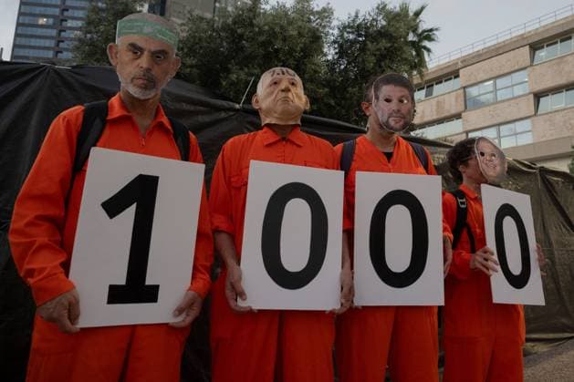 Day 1000 Since October 7th TEL AVIV, ISRAEL JULY 2, 2026: People gather at a rally in Tel Aviv, Israel, on July 2, 2026, marking 1,000 days since the October 7, 2023 attack. Former hostage Rom Braslavski, relatives of victims, survivors and released hostages attended the event, calling for the establishment of a state commission of inquiry into the circumstances surrounding the attack. Tel Aviv Israel Copyright: x xShaniexRothx xJNAxPressx