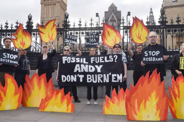 July 2, 2026, London, England, United Kingdom: Activists from Fossil Free London stage a protest outside the parliament calling on Andy Burnham, who is expected to become the next UK Prime Minister, not to open the North Sea to oil and gas projects like Jackdaw and Rosebank. London United Kingdom - ZUMAv130 20260702_zip_v130_041 Copyright: xVukxValcicx
