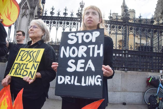 July 2, 2026, London, England, United Kingdom: Activists from Fossil Free London stage a protest outside the parliament calling on Andy Burnham, who is expected to become the next UK Prime Minister, not to open the North Sea to oil and gas projects like Jackdaw and Rosebank. London United Kingdom  - ZUMAv130 20260702_zip_v130_043 Copyright: xVukxValcicx