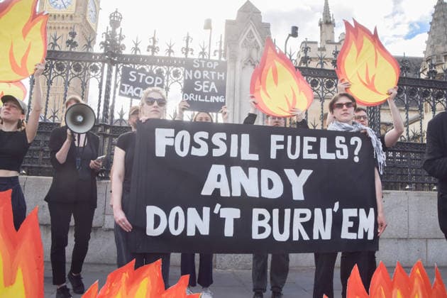 July 2, 2026, London, England, United Kingdom: Activists from Fossil Free London stage a protest outside the parliament calling on Andy Burnham, who is expected to become the next UK Prime Minister, not to open the North Sea to oil and gas projects like Jackdaw and Rosebank. London United Kingdom - ZUMAv130 20260702_zip_v130_046 Copyright: xVukxValcicx