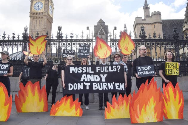 July 2, 2026, London, England, United Kingdom: Activists from Fossil Free London stage a protest outside the parliament calling on Andy Burnham, who is expected to become the next UK Prime Minister, not to open the North Sea to oil and gas projects like Jackdaw and Rosebank. London United Kingdom - ZUMAv130 20260702_zip_v130_047 Copyright: xVukxValcicx