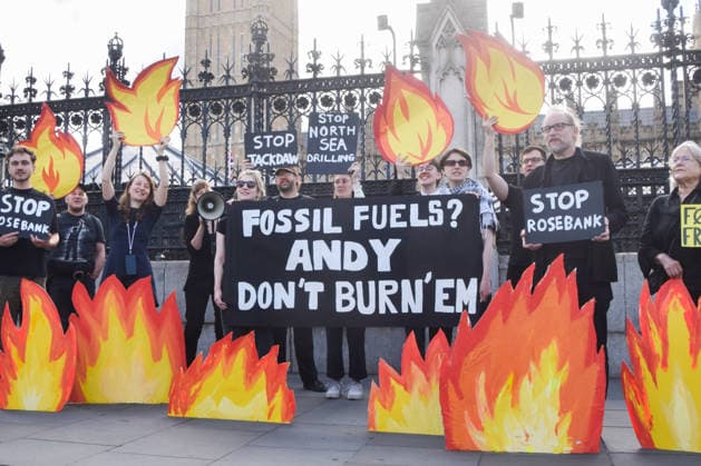 July 2, 2026, London, England, United Kingdom: Activists from Fossil Free London stage a protest outside the parliament calling on Andy Burnham, who is expected to become the next UK Prime Minister, not to open the North Sea to oil and gas projects like Jackdaw and Rosebank. London United Kingdom - ZUMAv130 20260702_zip_v130_048 Copyright: xVukxValcicx