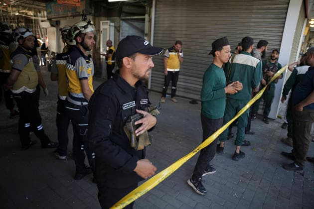 Damascus Cafe Blast Aftermath Investigated Syrian security personnel stand behind police tape outside a cafe in central Damascus, Syria, on July 2, 2026. An explosive device detonated inside a cafe in the al-Hijaz area near the Palace of Justice, killing people and injuring others, Syrian authorities said. Damascus Damascus Syria Copyright: xOmarxAlbamx