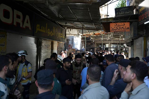 Damascus Cafe Blast Aftermath Investigated Syrian security personnel and members of the public gather in a commercial passage outside a cordoned-off cafe in central Damascus, Syria, on July 2, 2026. An explosive device detonated inside a cafe in the al-Hijaz area near the Palace of Justice, killing people and injuring others, Syrian authorities said. Damascus Damascus Syria Copyright: xOmarxAlbamx