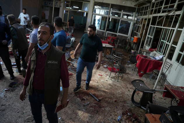 Damascus Cafe Blast Aftermath Investigated People inspect the damaged interior of a cafe in central Damascus, Syria, on July 2, 2026. An explosive device detonated inside a cafe in the al-Hijaz area near the Palace of Justice, killing people and injuring others, Syrian authorities said. Damascus Damascus Syria Copyright: xOmarxAlbamx