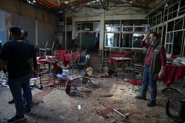 Damascus Cafe Blast Aftermath Investigated Men move through the damaged interior of a cafe in central Damascus, Syria, on July 2, 2026. An explosive device detonated inside the cafe near the Palace of Justice in the al-Hijaz area, killing people and injuring others, Syrian authorities said. Damascus Damascus Syria Copyright: xOmarxAlbamx