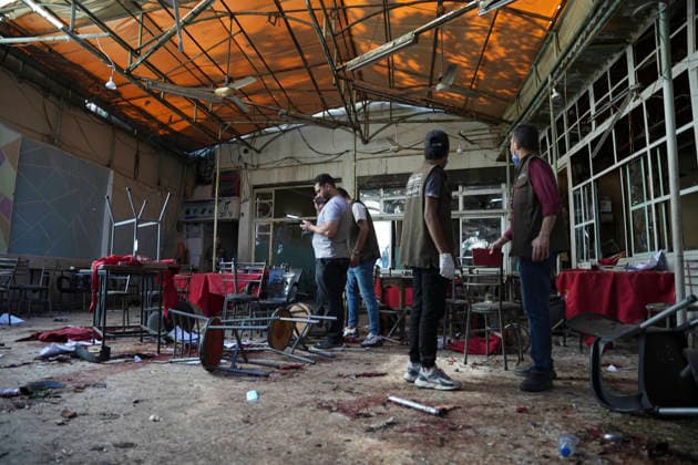 Damascus Cafe Blast Aftermath Investigated Men move through the damaged interior of a cafe in central Damascus, Syria, on July 2, 2026. An explosive device detonated inside the cafe near the Palace of Justice in the al-Hijaz area, killing people and injuring others, Syrian authorities said. Damascus Damascus Syria Copyright: xOmarxAlbamx