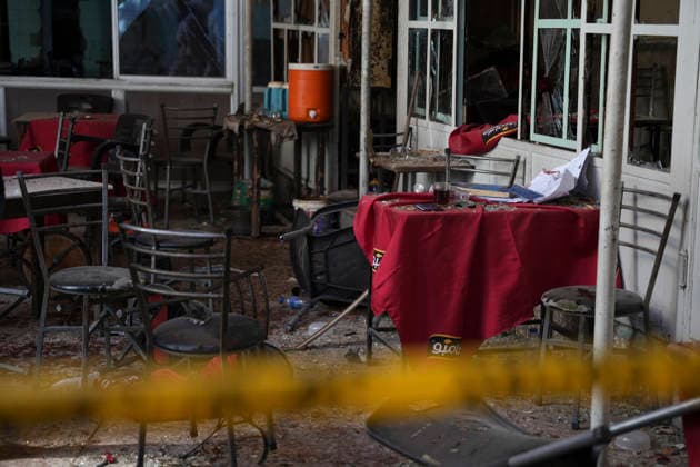Damascus Cafe Blast Aftermath Investigated Damaged furniture, debris and blood stains are seen behind police tape inside a cafe in central Damascus, Syria, on July 2, 2026. An explosive device detonated inside the cafe near the Palace of Justice in the al-Hijaz area, killing people and injuring others, Syrian authorities said. Damascus Damascus Syria Copyright: xOmarxAlbamx
