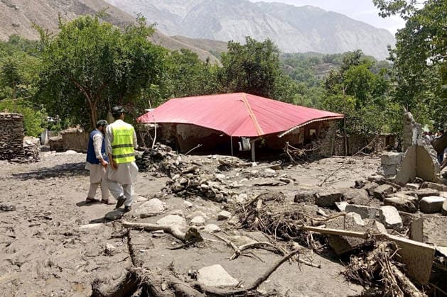 July 2, 2026, Peshawar, Peshawar, Pakistan: CHITRAL, Pakistan July 1, 2026: Volunteers from Al-Khidmat Foundation assess damage and distribute emergency relief supplies, including tents, tarpaulins, food packages, and other essential items, to families affected by flash floods in the Barzi area of Lower Chitral. According to the foundation, at least 12 houses were completely destroyed and several others were partially damaged after overnight torrential rains triggered flash flooding. Relief teams were deployed immediately to assess the damage and provide humanitarian assistance to displaced families as emergency response efforts continue. Peshawar Pakistan - ZUMAa217 20260702_znp_a217_019 Copyright: xHussainxAlix