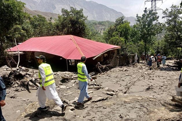 July 2, 2026, Peshawar, Peshawar, Pakistan: CHITRAL, Pakistan July 1, 2026: Volunteers from Al-Khidmat Foundation assess damage and distribute emergency relief supplies, including tents, tarpaulins, food packages, and other essential items, to families affected by flash floods in the Barzi area of Lower Chitral. According to the foundation, at least 12 houses were completely destroyed and several others were partially damaged after overnight torrential rains triggered flash flooding. Relief teams were deployed immediately to assess the damage and provide humanitarian assistance to displaced families as emergency response efforts continue. Peshawar Pakistan - ZUMAa217 20260702_znp_a217_020 Copyright: xHussainxAlix