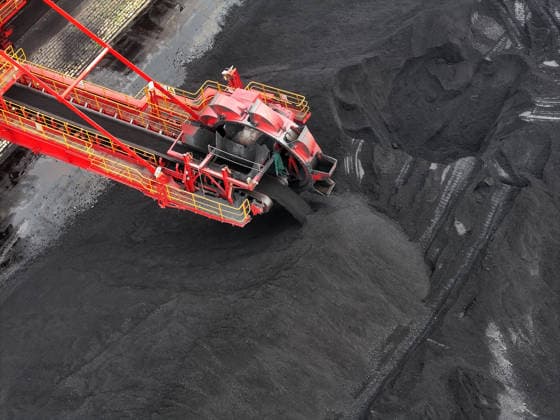 Lianyungang Port Coal Terminal LIANYUNGANG, CHINA - JULY 3, 2026 - Large machinery is stacking and storing imported coal at the coal terminal yard of Lianyungang Port in Jiangsu Province, China on July 3, 2026. Lianyungang Jiangsu China  Copyright: xCFOTOx i1783069298450