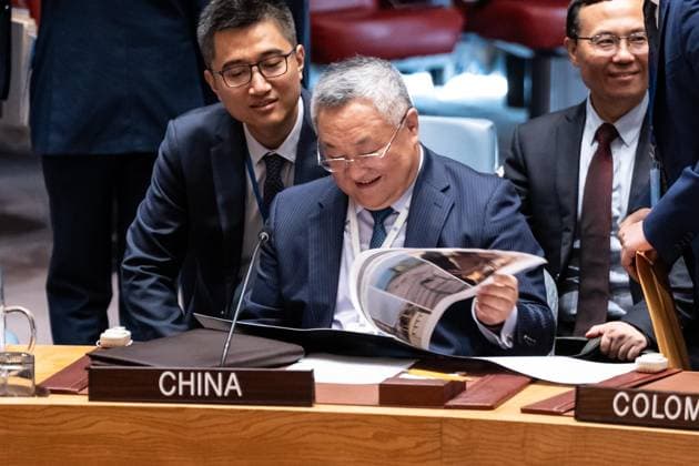 July 2, 2026, New York, New York, USA: Ambassador Fu Cong of China examines photographs of civilian targets hit by Iranian drones and missiles on the ground of Kingdom of Bahrain before the start of Security Council meeting on The situation in the Middle East requested by Kingdom of Bahrain at UN Headquarters in New York, NY on July 2, 2026. New York USA - ZUMAr339 20260702_znp_r339_002 Copyright: xLevxRadinx