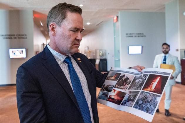 July 2, 2026, New York, New York, USA: Ambassador Mike Waltz of the United States holds photographs of civilian targets hit by Iranian drones and missiles while speaking to the press after Security Council meeting on The situation in the Middle East requested by Kingdom of Bahrain at UN Headquarters in New York, NY on July 2, 2026. New York USA  - ZUMAr339 20260702_znp_r339_020 Copyright: xLevxRadinx