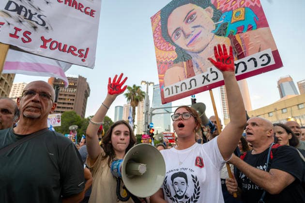 July 2, 2026, Tel Aviv, Israel: Protesters hold placards during an anti-government rally. A rally was held to mark 1,000 days since the October 7 massacre. Demonstrators protested against the Israeli government, accusing it of responsibility for the failures that led to the attack and calling for a state commission of inquiry, which they say the government opposes because its findings could implicate Prime Minister Benjamin Netanyahu. Tel Aviv Israel  - ZUMAs197 20260702_aaa_s197_314 Copyright: xYaelxGuiskyxAbasx