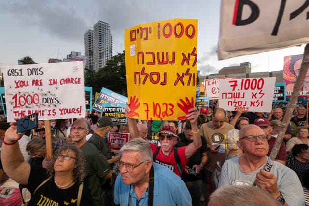 July 2, 2026, Tel Aviv, Israel: Protesters hold placards during an anti-government rally. A rally was held to mark 1,000 days since the October 7 massacre. Demonstrators protested against the Israeli government, accusing it of responsibility for the failures that led to the attack and calling for a state commission of inquiry, which they say the government opposes because its findings could implicate Prime Minister Benjamin Netanyahu. Tel Aviv Israel - ZUMAs197 20260702_aaa_s197_312 Copyright: xYaelxGuiskyxAbasx