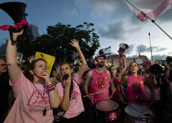 July 2, 2026, Tel Aviv, Israel: Activists from the Pink Front take part during an anti-government rally. A rally was held to mark 1,000 days since the October 7 massacre. Demonstrators protested against the Israeli government, accusing it of responsibility for the failures that led to the attack and calling for a state commission of inquiry, which they say the government opposes because its findings could implicate Prime Minister Benjamin Netanyahu. Tel Aviv Israel  - ZUMAs197 20260702_aaa_s197_327 Copyright: xYaelxGuiskyxAbasx