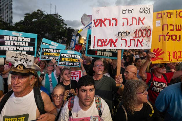 July 2, 2026, Tel Aviv, Israel: Protesters hold placards during an anti-government rally. A rally was held to mark 1,000 days since the October 7 massacre. Demonstrators protested against the Israeli government, accusing it of responsibility for the failures that led to the attack and calling for a state commission of inquiry, which they say the government opposes because its findings could implicate Prime Minister Benjamin Netanyahu. Tel Aviv Israel - ZUMAs197 20260702_aaa_s197_336 Copyright: xYaelxGuiskyxAbasx