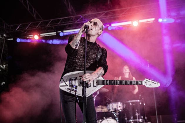 July 2, 2026, Soliera, Emilia Romagna, Italy: Singer and guitarist Craig Dyer of the British post-punk band The Underground Youth performs on stage during a concert. Singer and guitarist Craig Dyer performed on stage at Piazza Lusvardi in Soliera (Modena) during a concert by British post-punk band The Underground Youth. The event marked the opening night of the nineteenth edition of the Arti Vive Festival. Soliera Italy - ZUMAs197 20260702_aaa_s197_416 Copyright: xCarloxVerganix