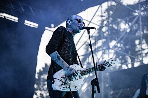 July 2, 2026, Soliera, Emilia Romagna, Italy: Singer and guitarist Craig Dyer of the British post-punk band The Underground Youth performs on stage during a concert. Singer and guitarist Craig Dyer performed on stage at Piazza Lusvardi in Soliera (Modena) during a concert by British post-punk band The Underground Youth. The event marked the opening night of the nineteenth edition of the Arti Vive Festival. Soliera Italy - ZUMAs197 20260702_aaa_s197_425 Copyright: xCarloxVerganix
